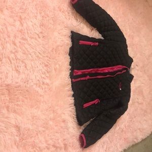A black and hot pink jacket